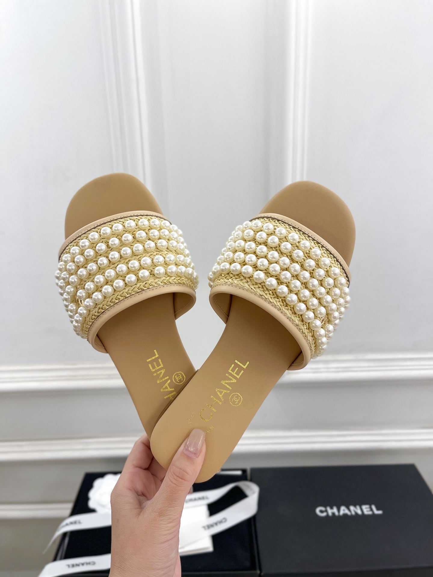 CHANEL FLAT SLIDE IN FLAX YELLOW CALFSKIN WITH PEARLS
