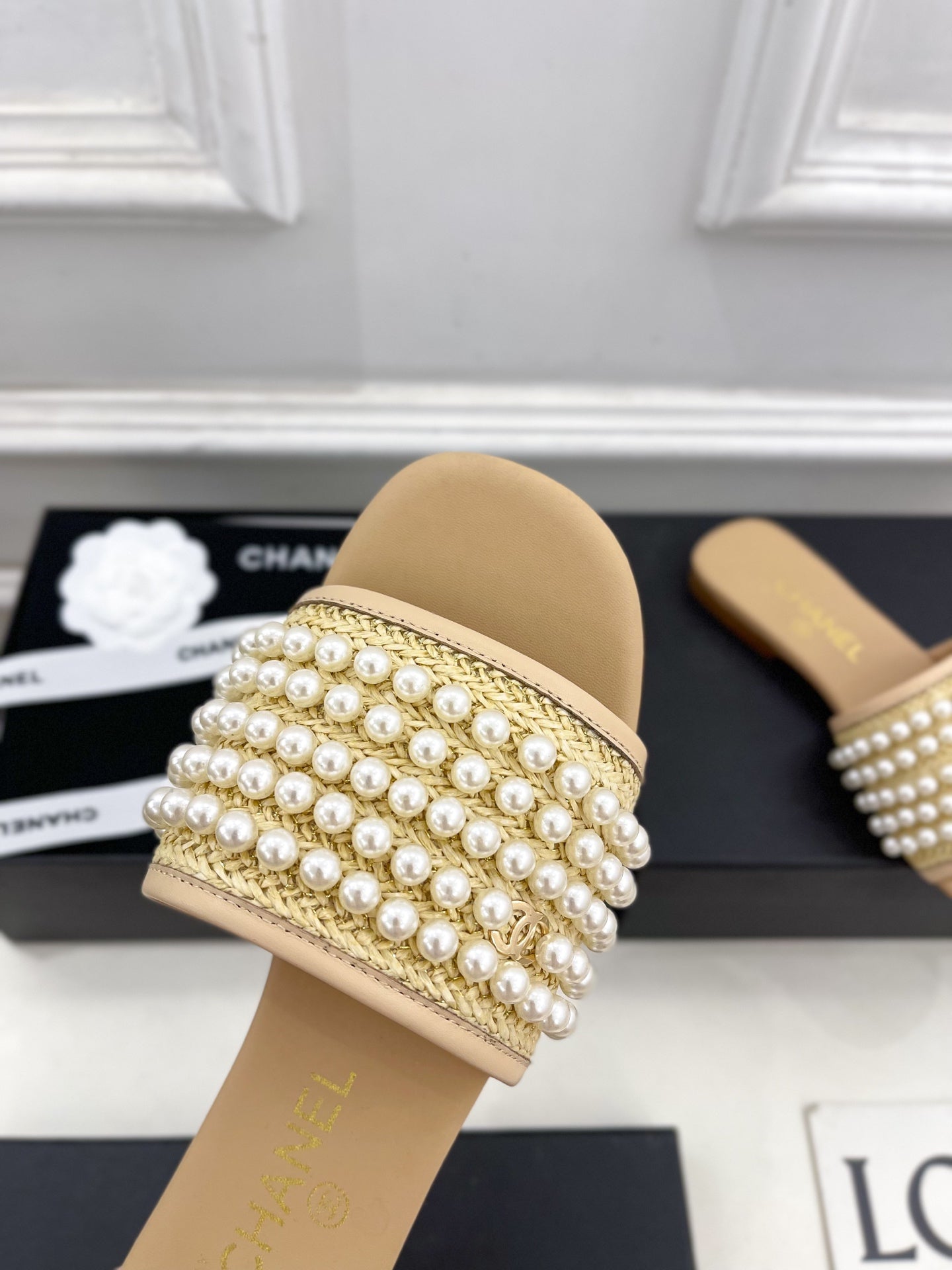 CHANEL FLAT SLIDE IN FLAX YELLOW CALFSKIN WITH PEARLS